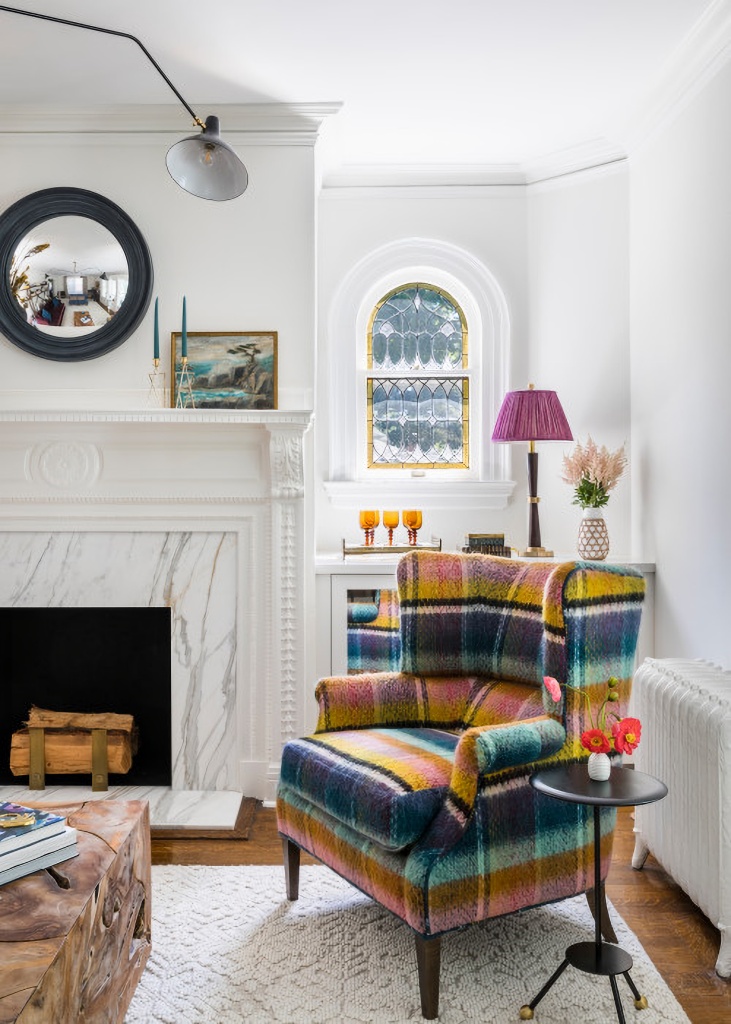 bold patterned plaid wing chair in living room
