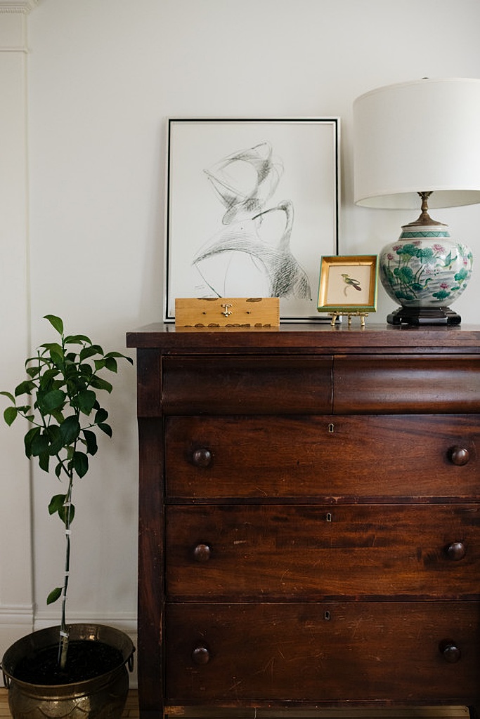 vintage wood dressier in simple bedroom