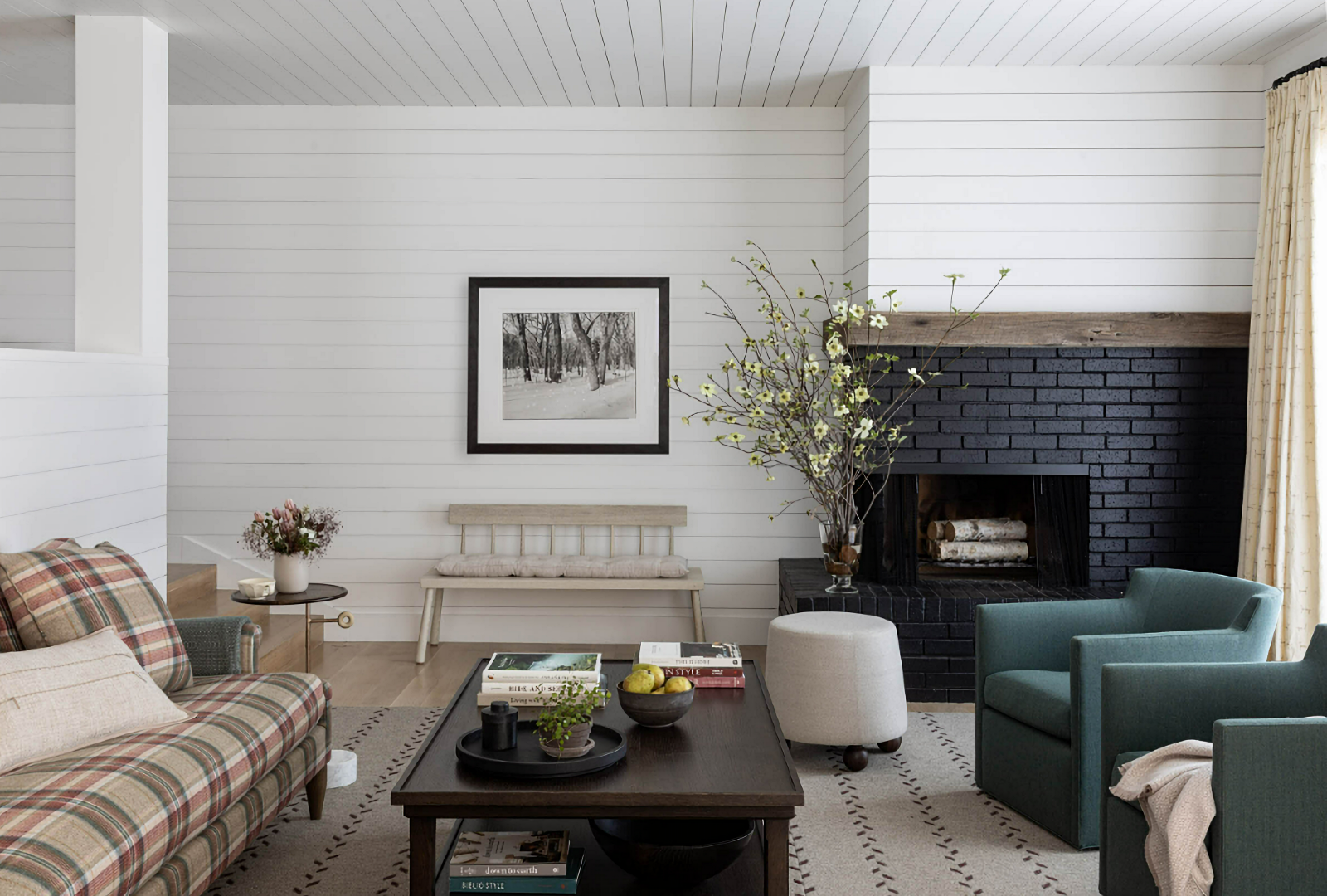 country living room with black corner fireplace