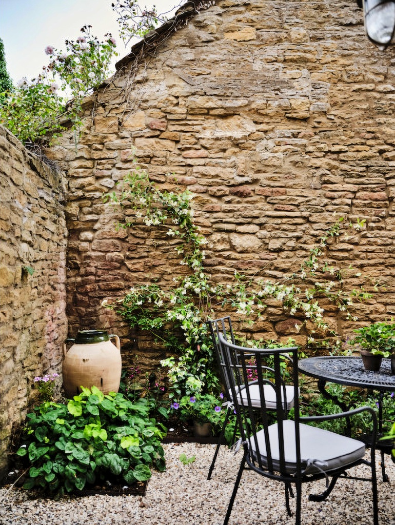 graveled English cottage courtyard