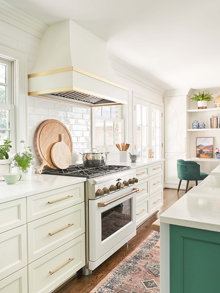 galley style white and green kitchen