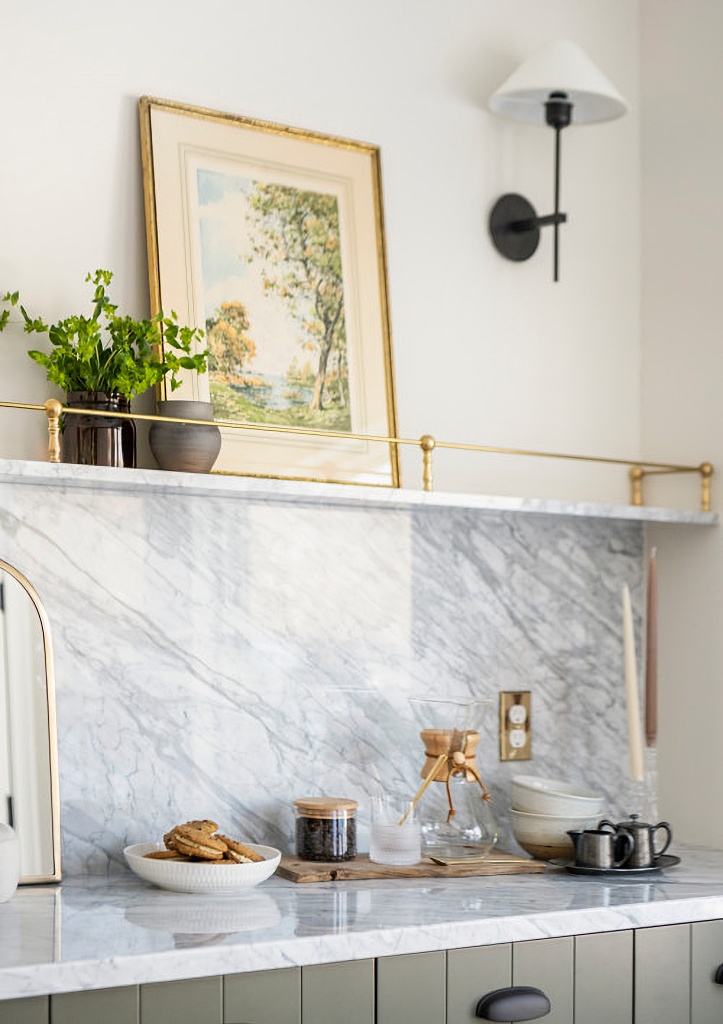 marble shelf with gold trim in dining room