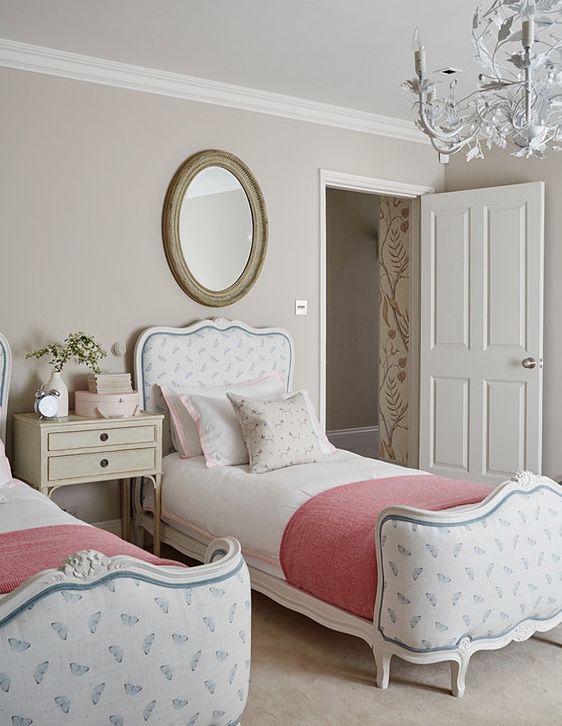 Feminine Victorian bedroom with twin beds
