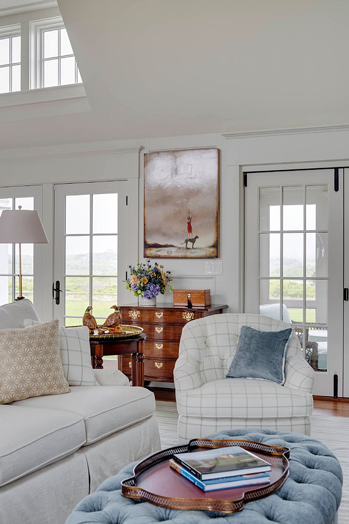 Classic coastal style living room with large windows