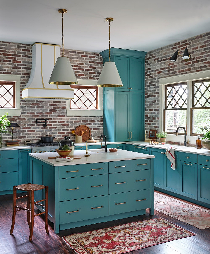 red brick walls in turquoise kitchen
