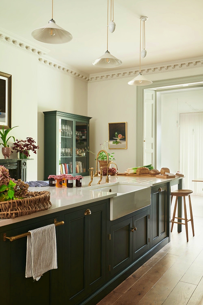 English kitchen with green cabinetry