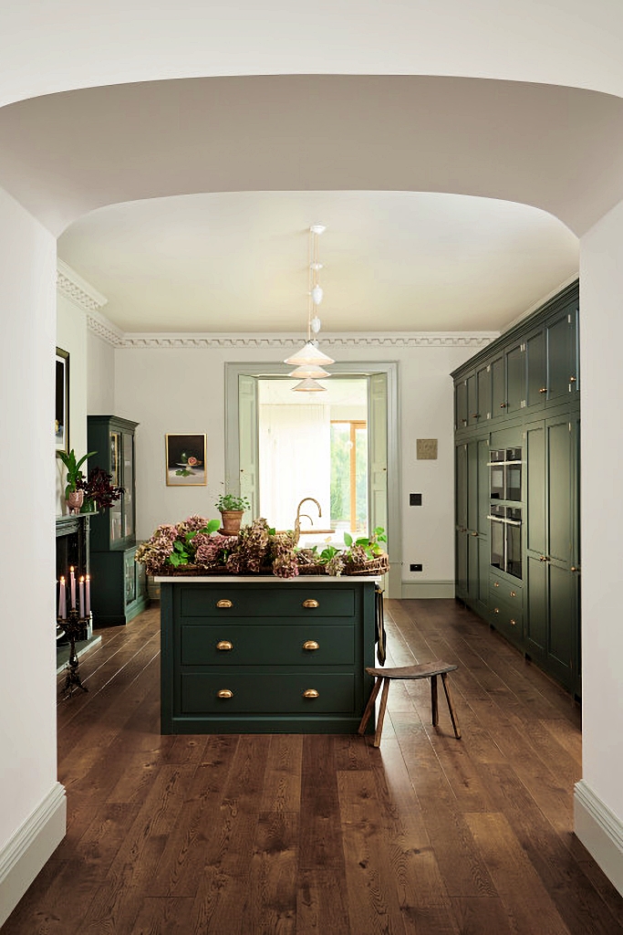 english kitchen with green cabinets