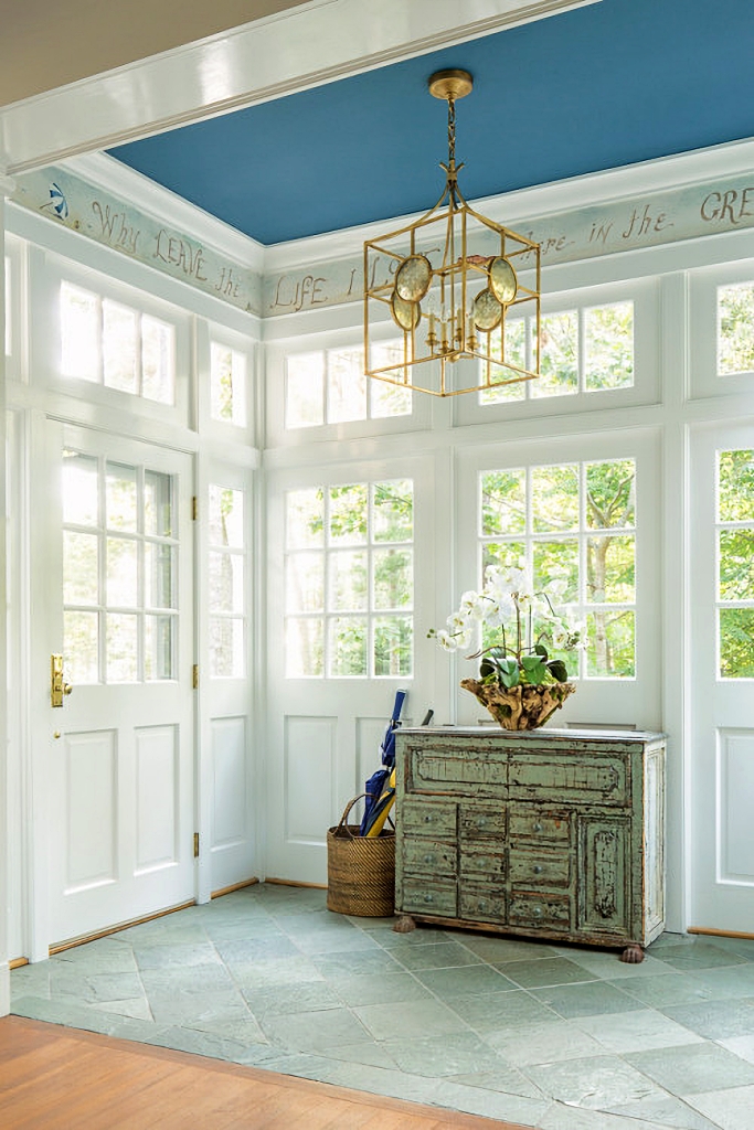 pale blue-green stone tile in sunroom