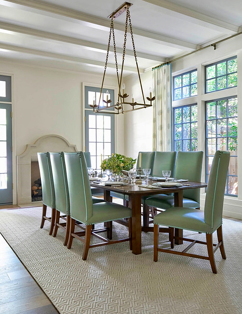 transitional dining room with large window