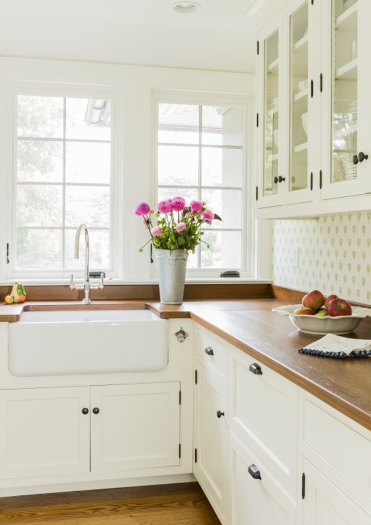 white kitchen with wood counter tops