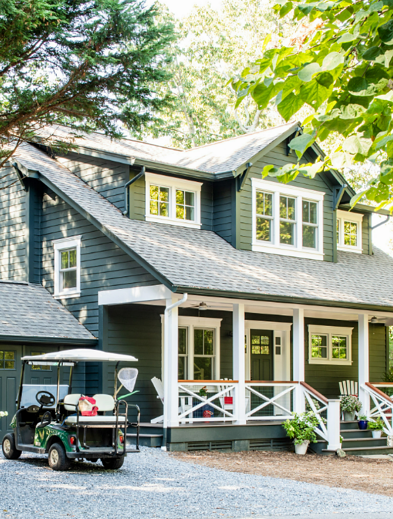 dark green cottage exterior