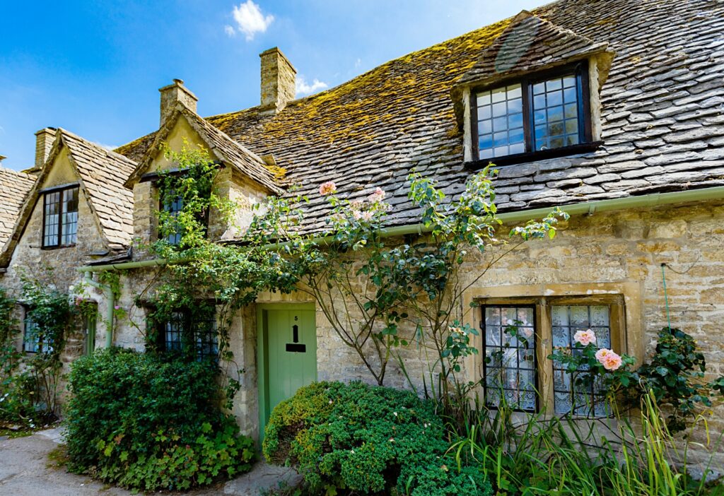 Medieval Cotswold stone cottages of Arlington Row in the village of Bibury, England