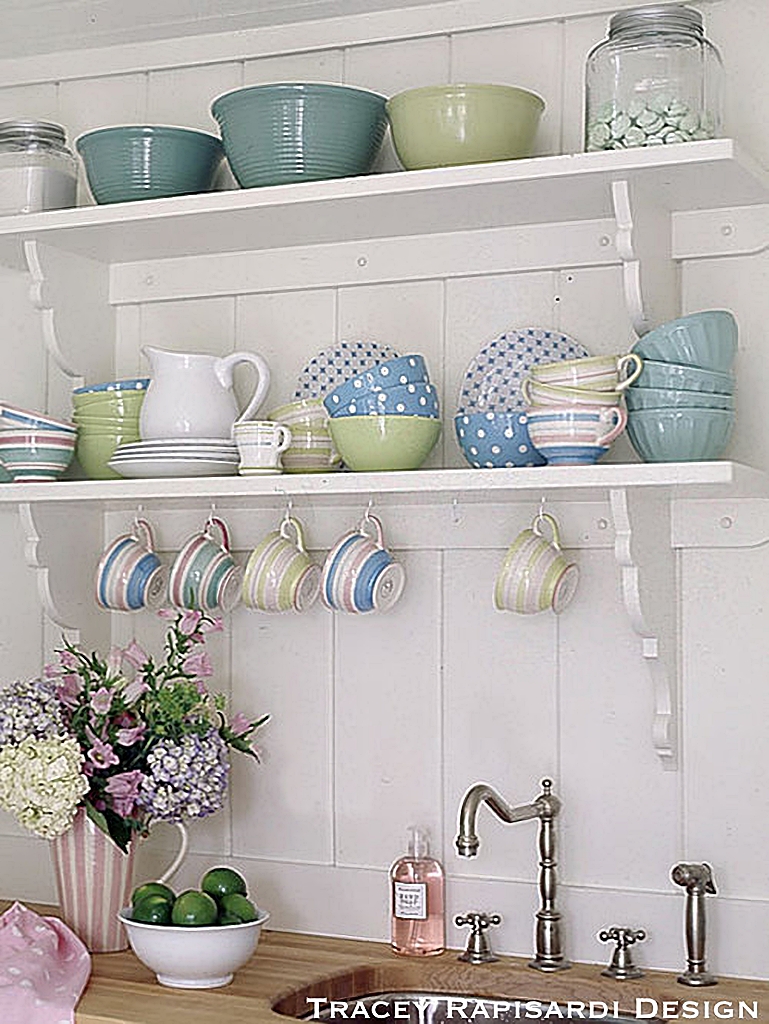 pastel dinnerware on open shelf