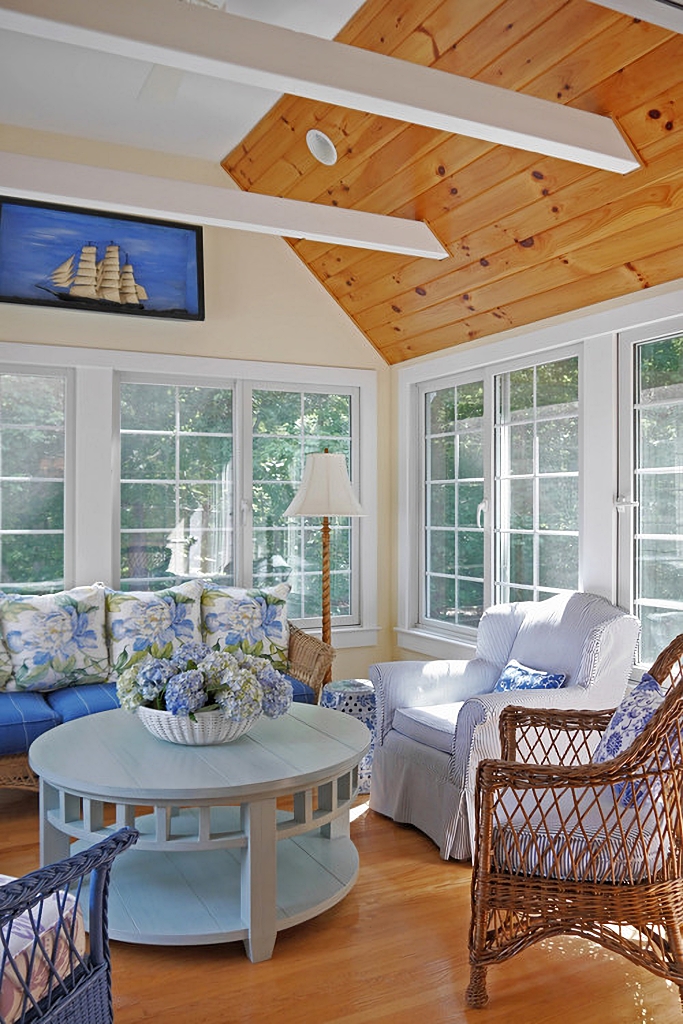 three season indoor porch in blue and white