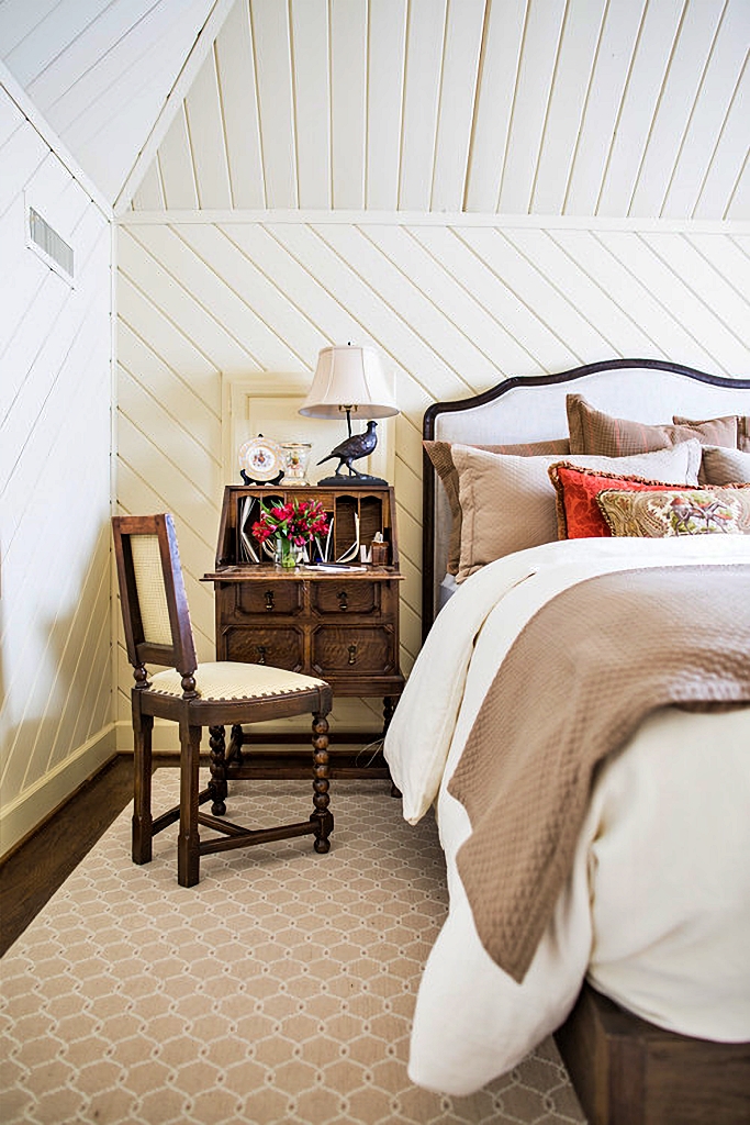 cottage style bedroom with white plank walls