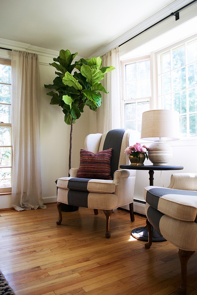 striped wing chairs in dining room