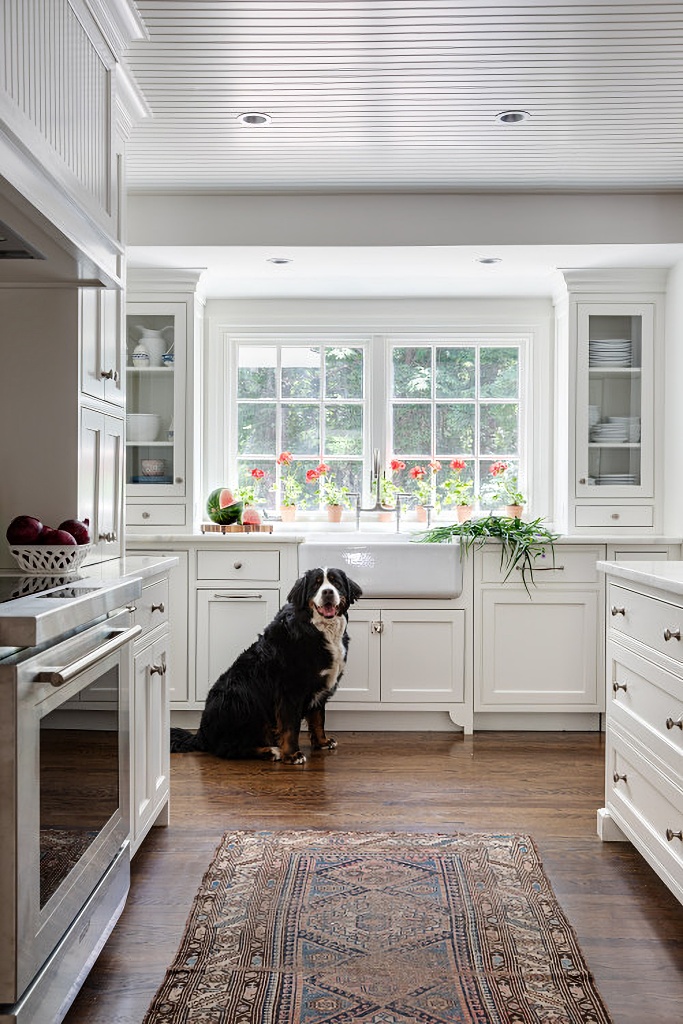 white traditional kitchen with apron sink