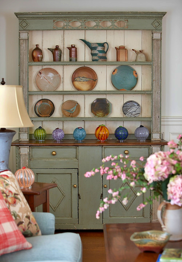 dining hutch with colorful pottery