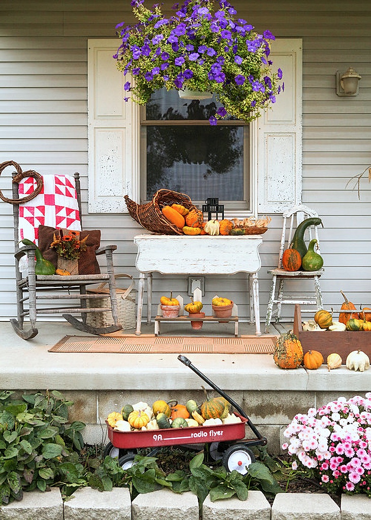 fall porch with lots of gourds
