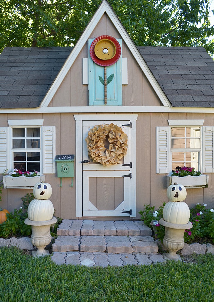 whimsical playhouse decorated for Halloween