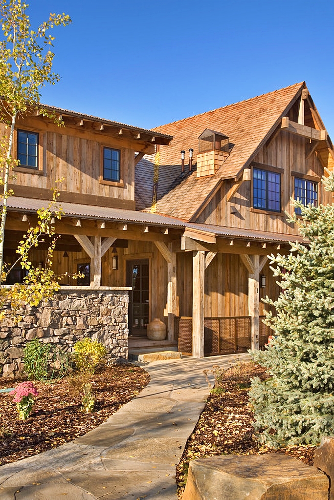 A Beautiful Ranch-Style Home With Stone And Wood Accents