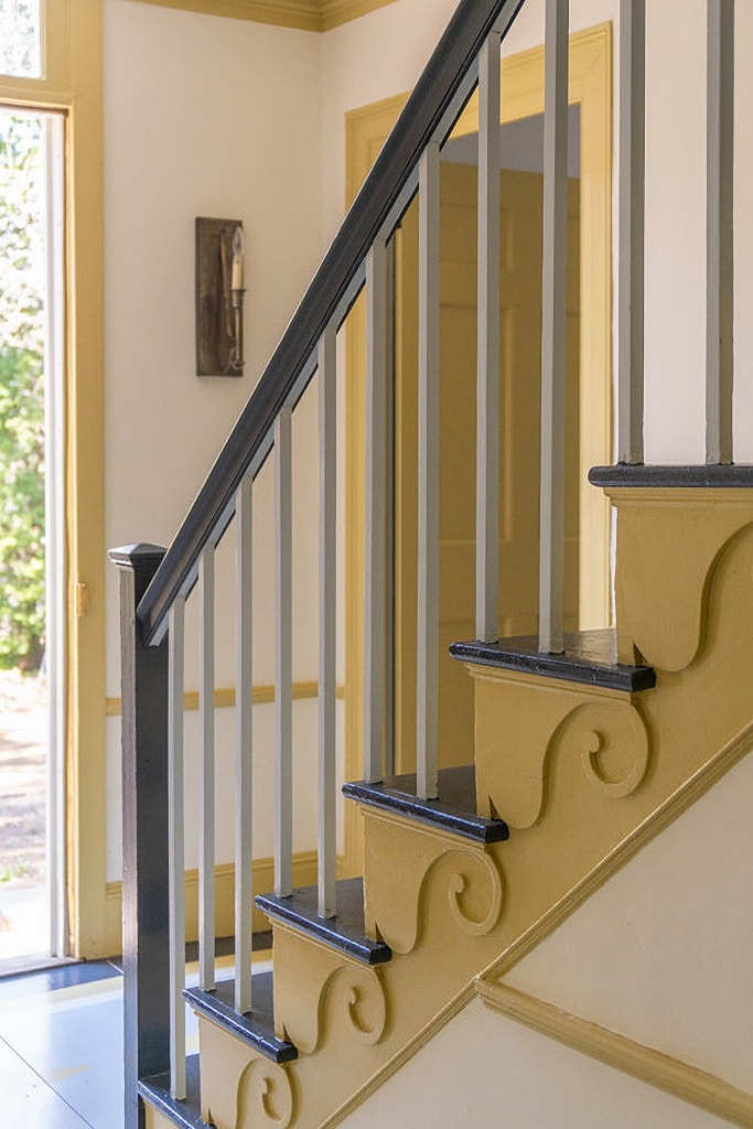 yellow and gray painted staircase