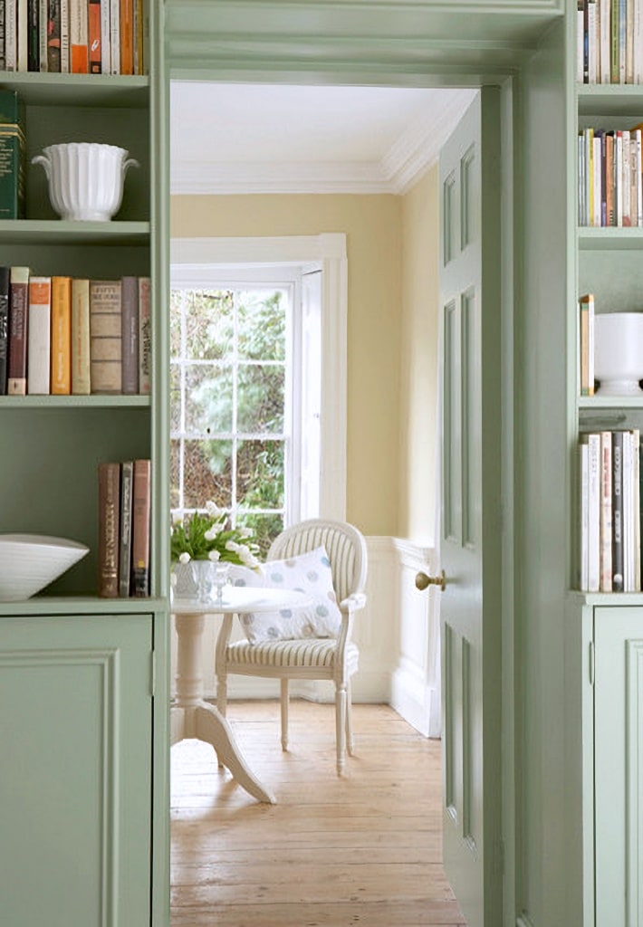 pale green built-in bookcases