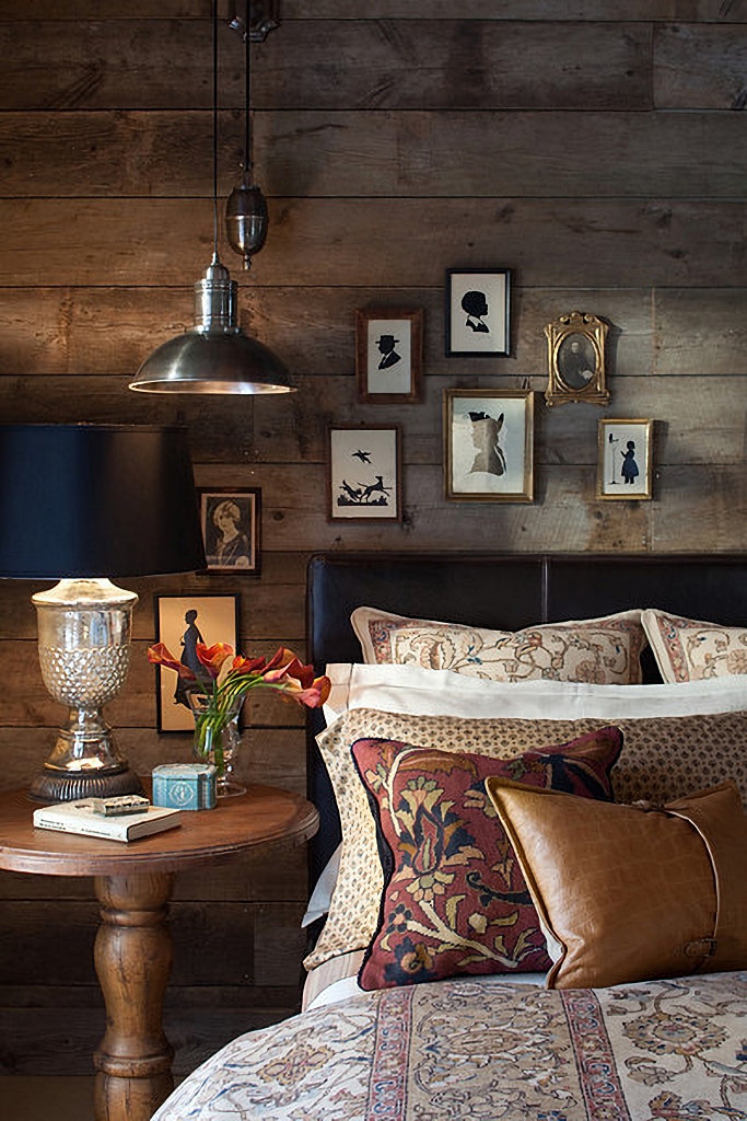 bedroom with dark wood paneling