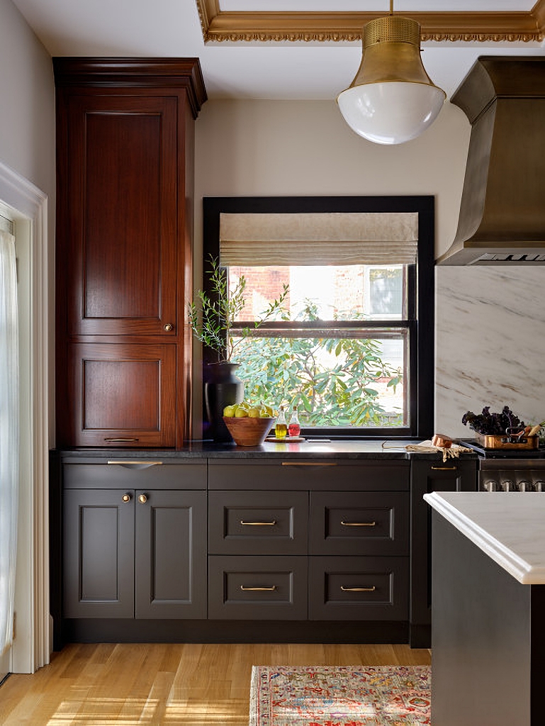 cozy kitchen with wood and painted cabinets