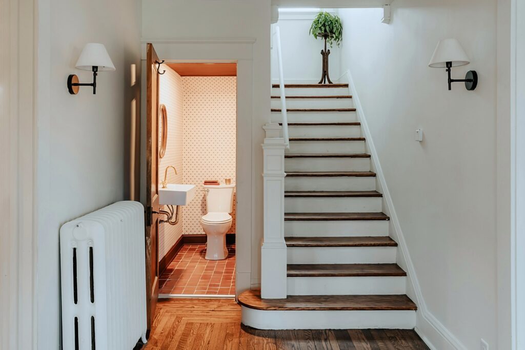 powder room tucked under staircase