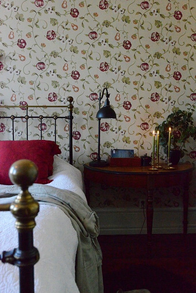 Vining floral wallpaper in master bedroom