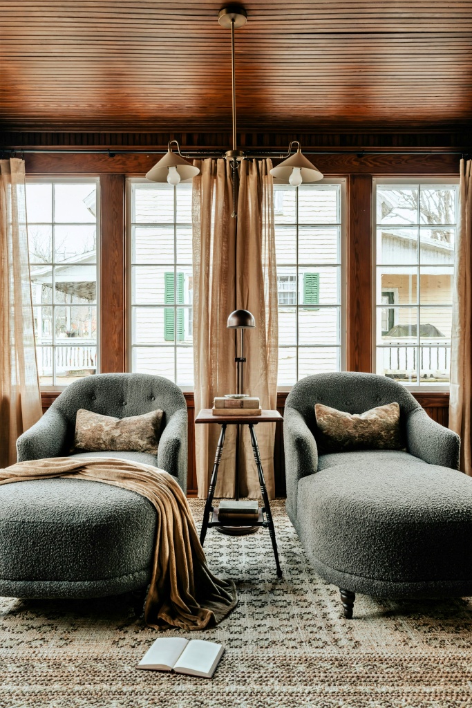 Sunroom with pair of loungers in neutral tones