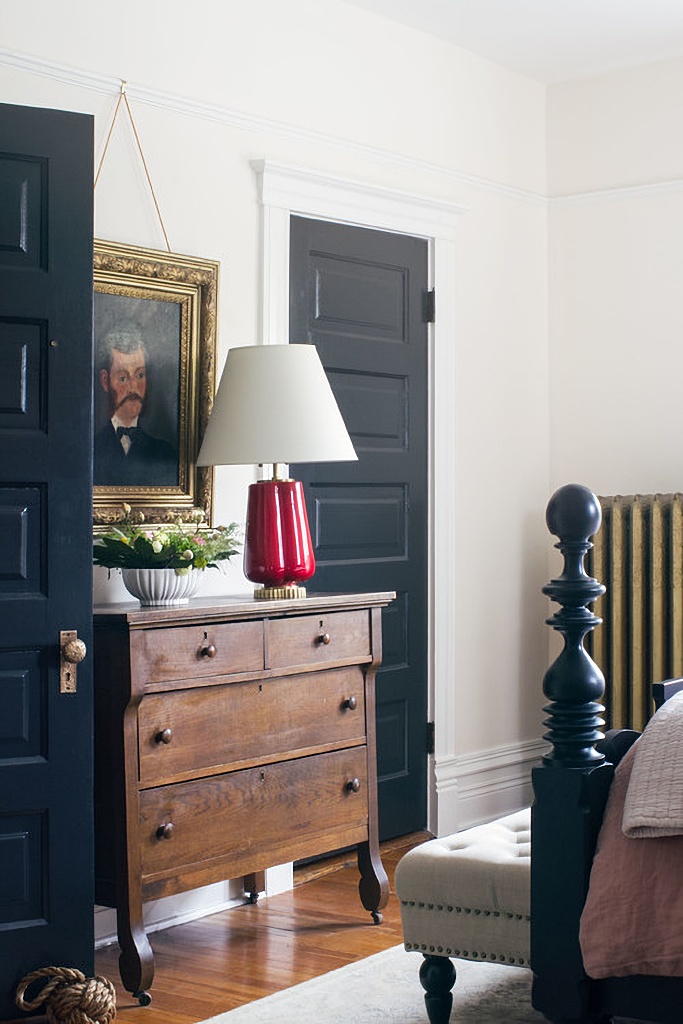 vintage wood furniture in historic home bedroom