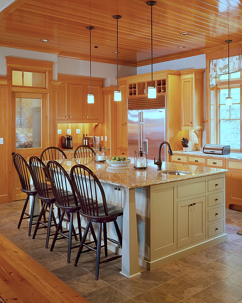 mustard yellow kitchen with large kitchen island