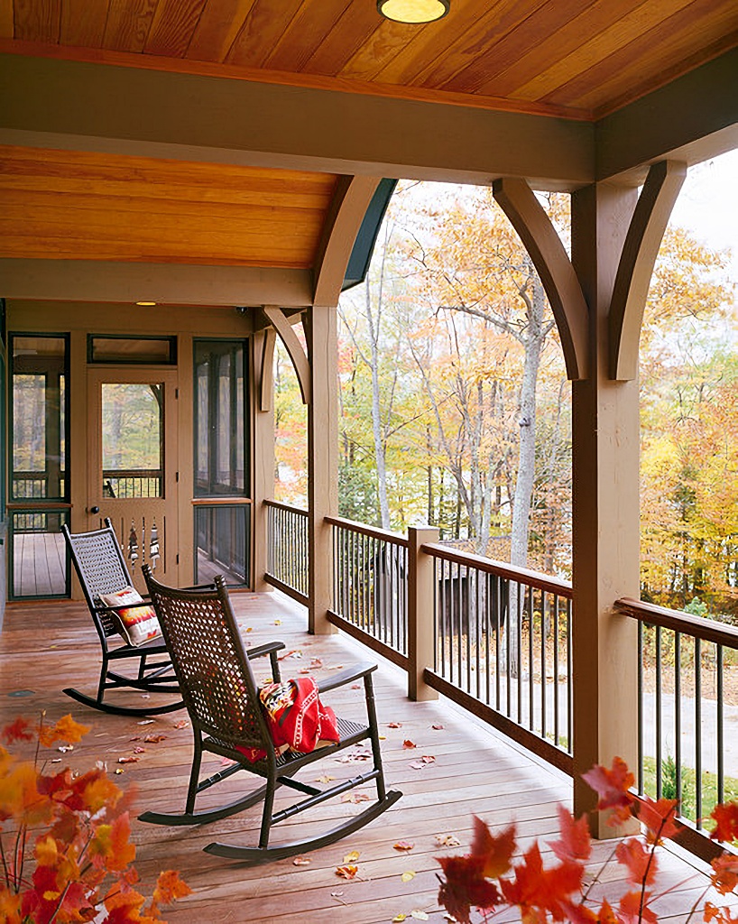 Covered porch with view of mountains