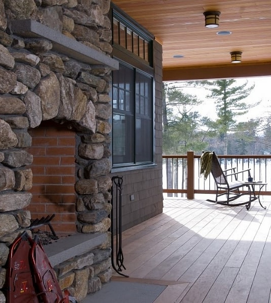 Covered porch with fireplace