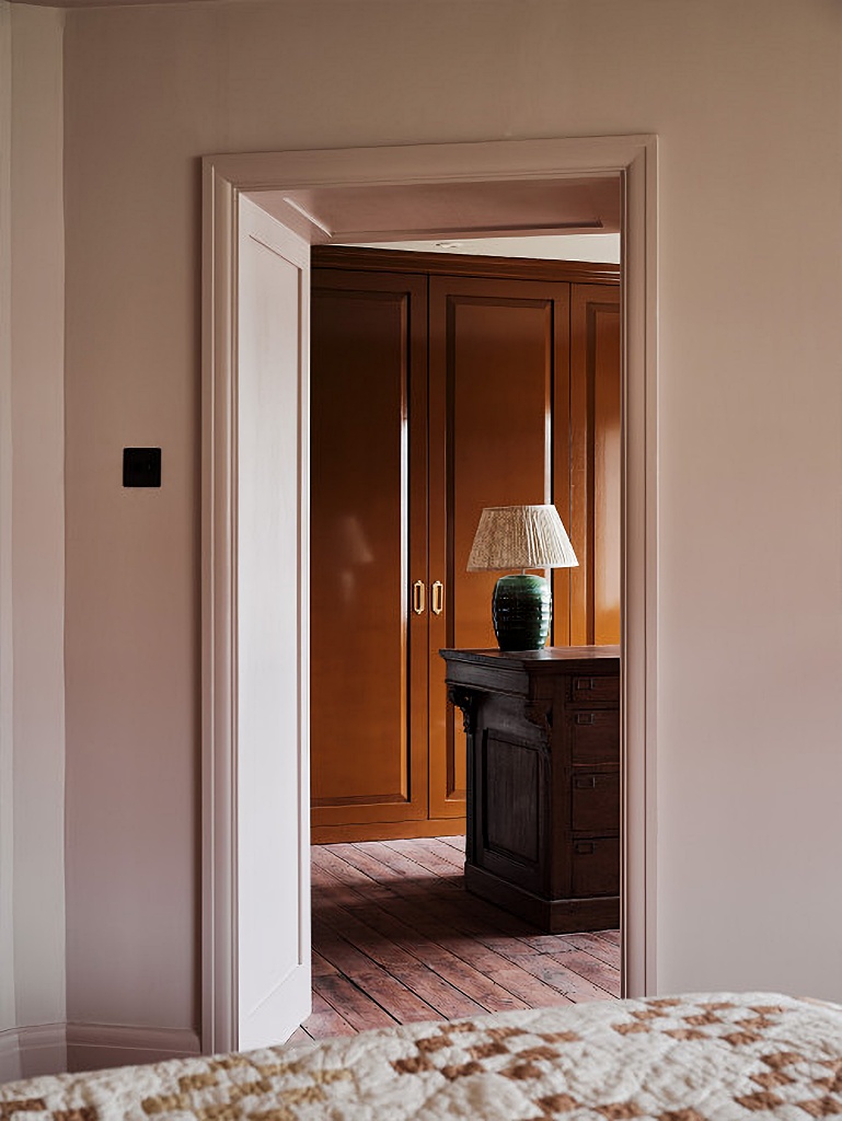 walk-in bedroom closet with armoire