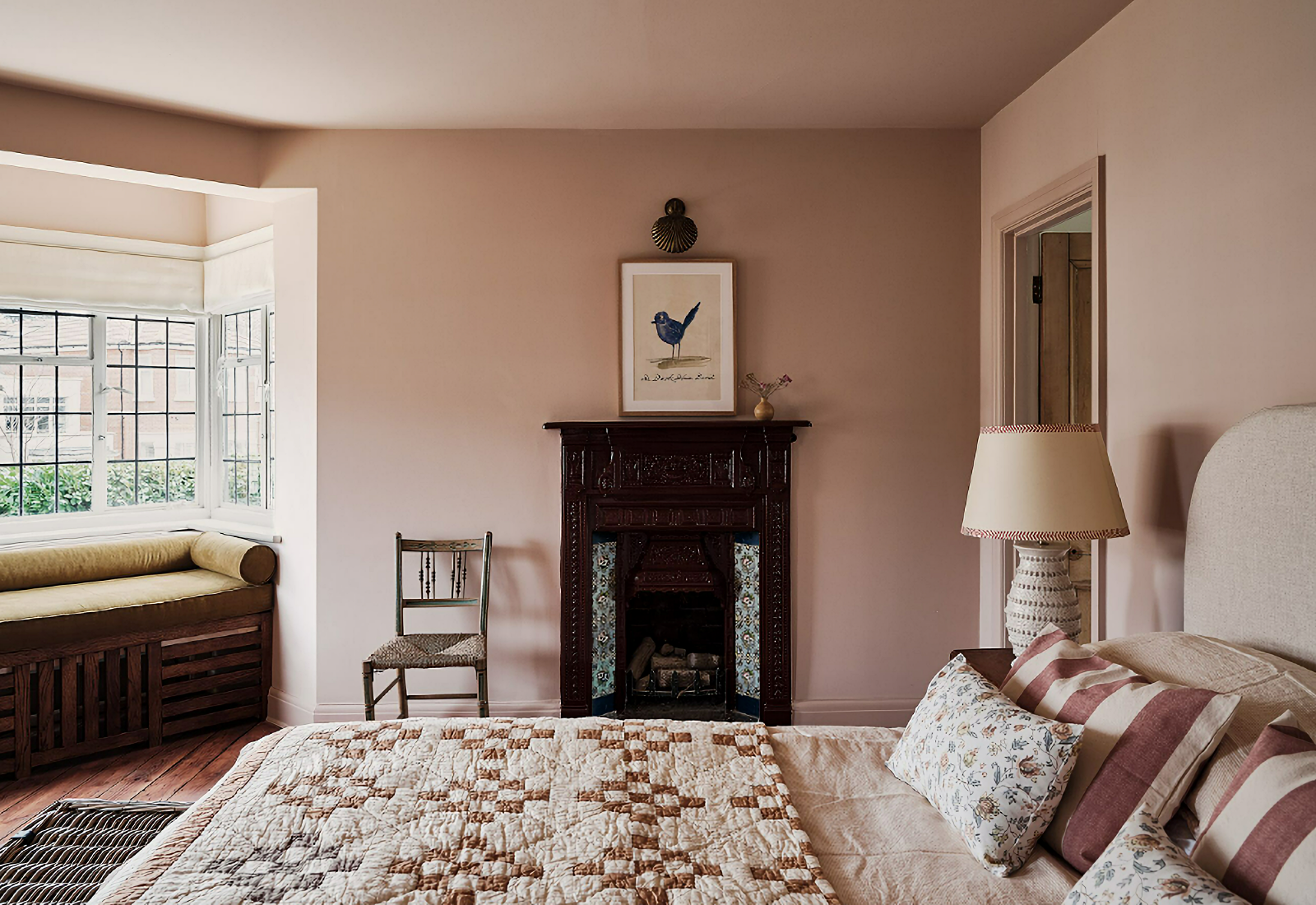 soft English bedroom with fireplace