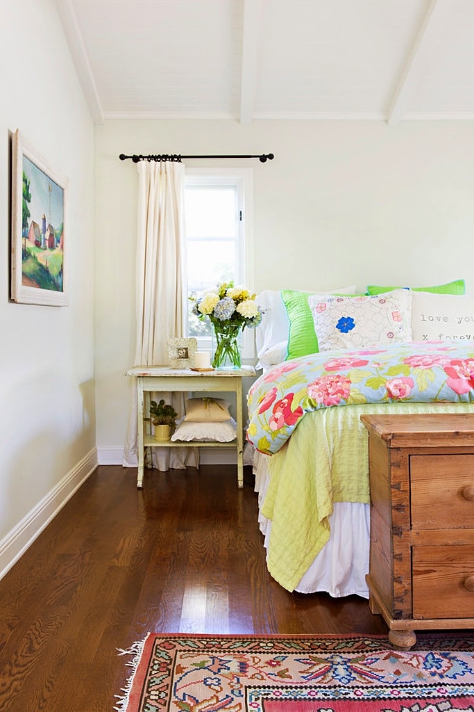 colorful bedding in master bedroom