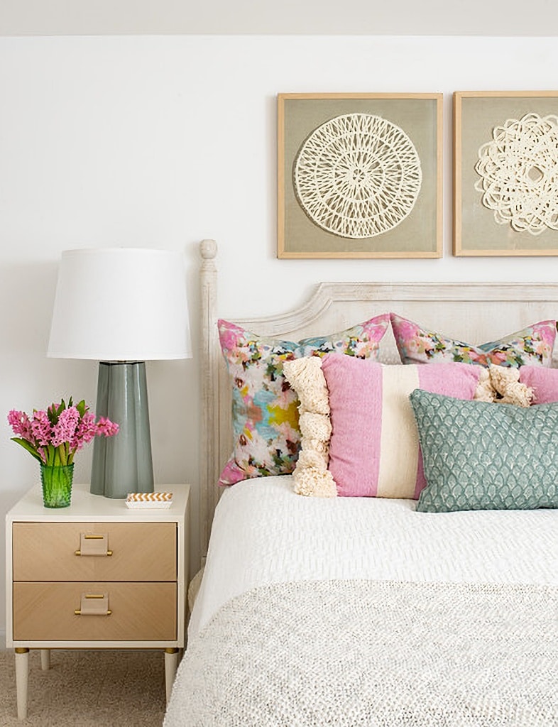 pastel pillows in guest bedroom