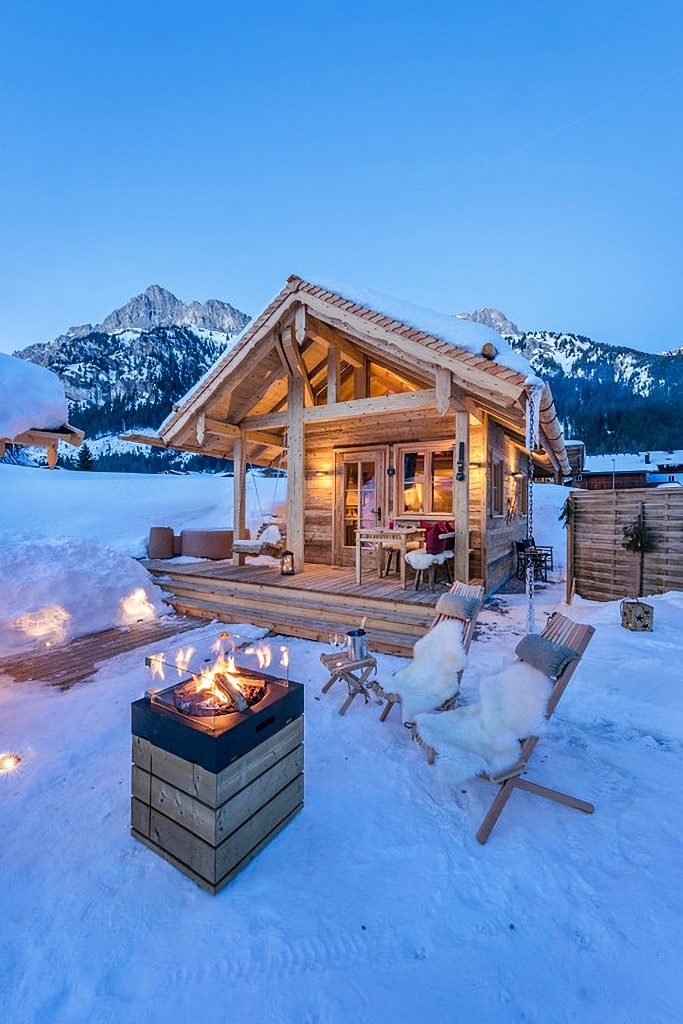 cabin style tiny home in winter