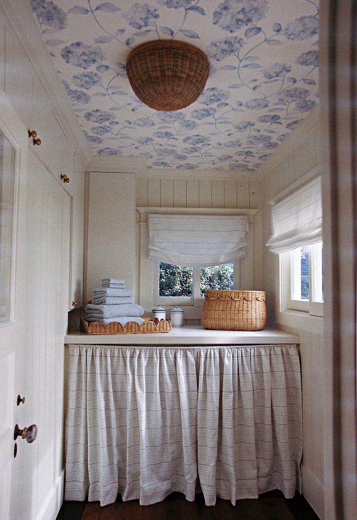 white and blue cottage laundry room