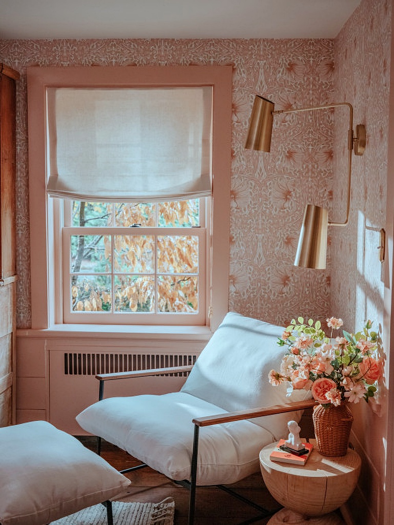 cozy white chair in pink dining room