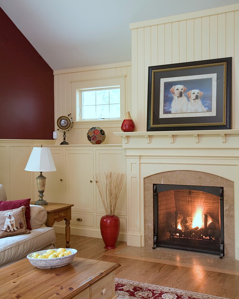 Red and cream living room with fireplace
