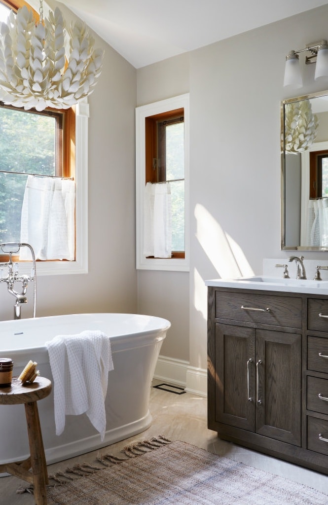 organic decorating in a bathroom with free standing tub