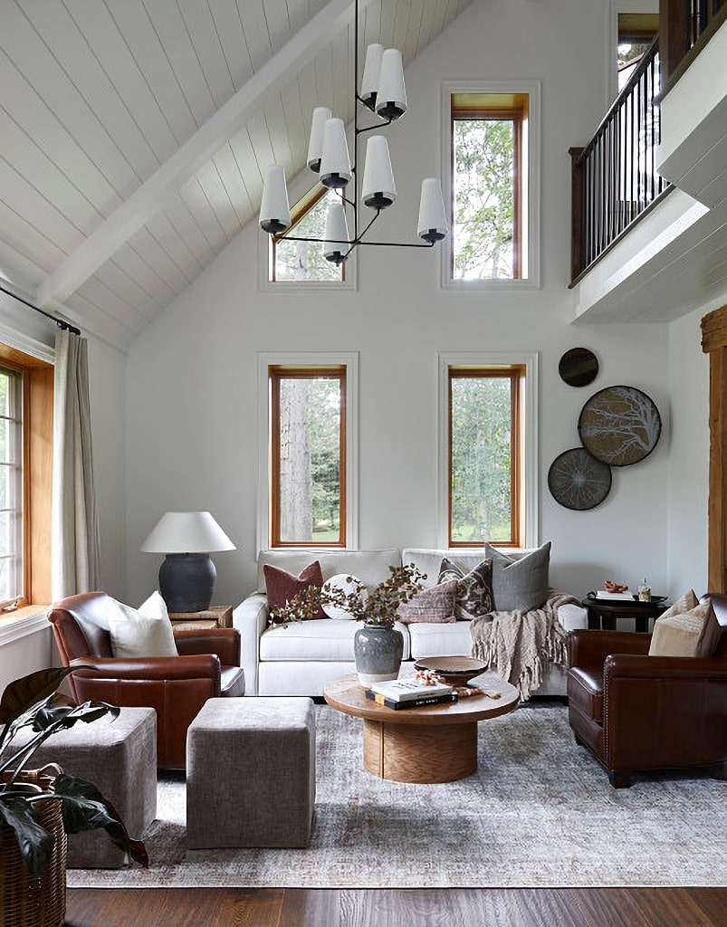 neutral modern living room with vaulted ceiling