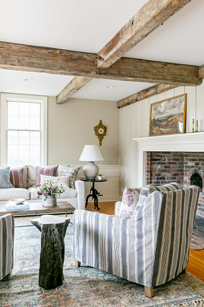 family room with linen furniture and brick fireplace