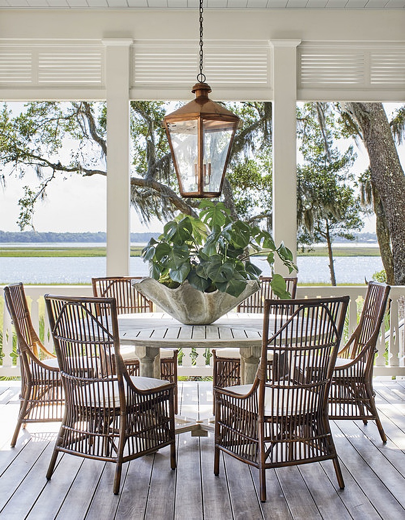 southern porch dining with rattan chairs