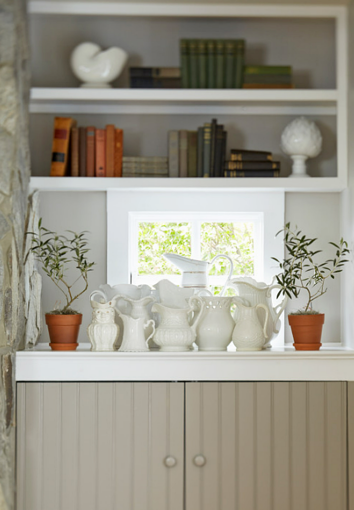 white ironstone collection in living room

