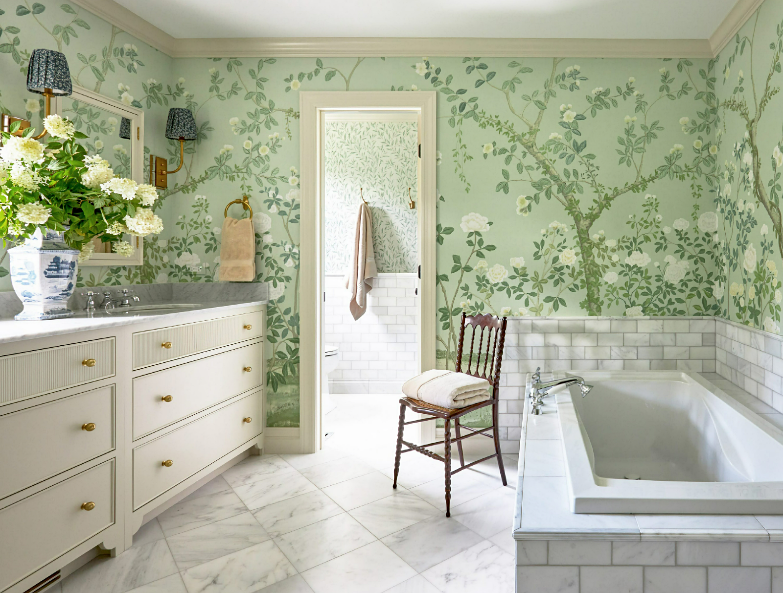 traditional bathroom with floral wallpaper